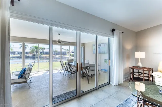 a view of a house with backyard and swimming pool