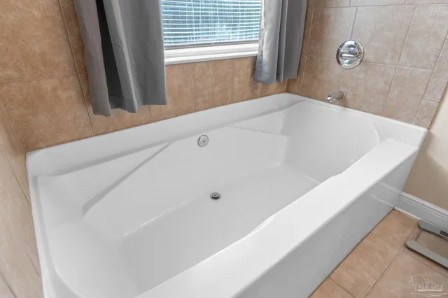 a bathroom with a bathtub