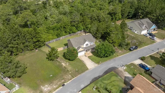 a view of a lake with a yard