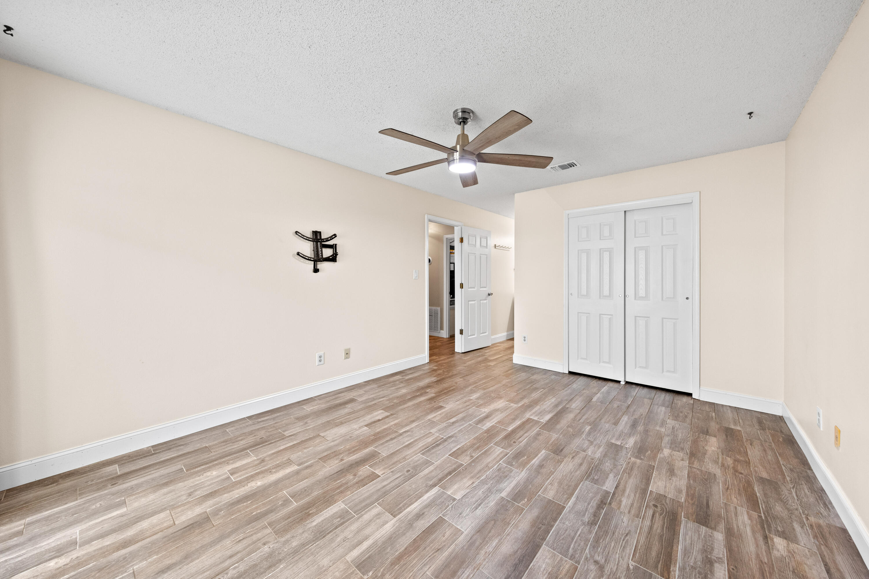 1833 Hunters Path Fort Walton Beach, FL 32547 - Photo 22 of 43 wooden floor in an empty room