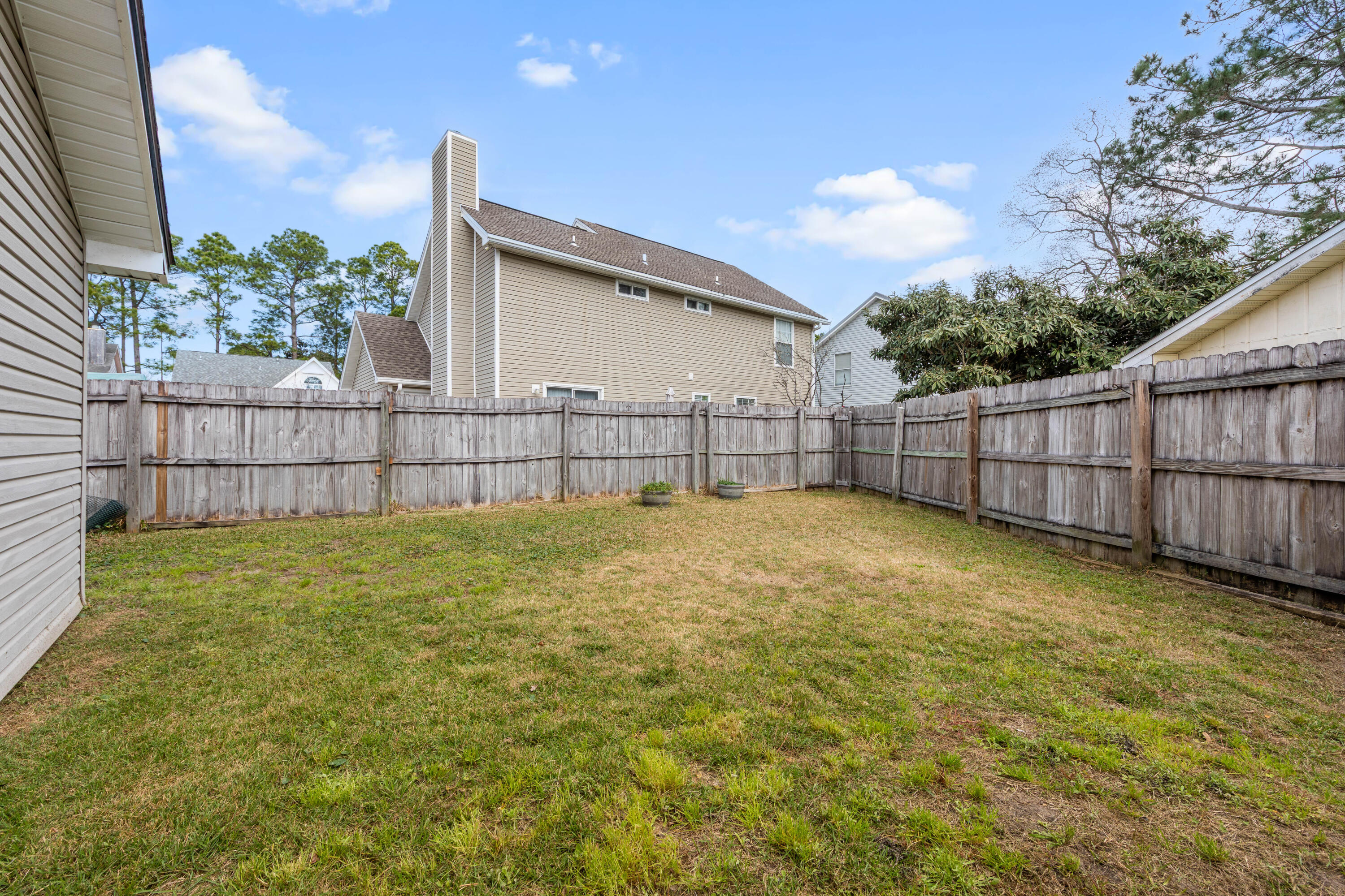 1833 Hunters Path Fort Walton Beach, FL 32547 - Photo 39 of 43 a view of backyard and tree