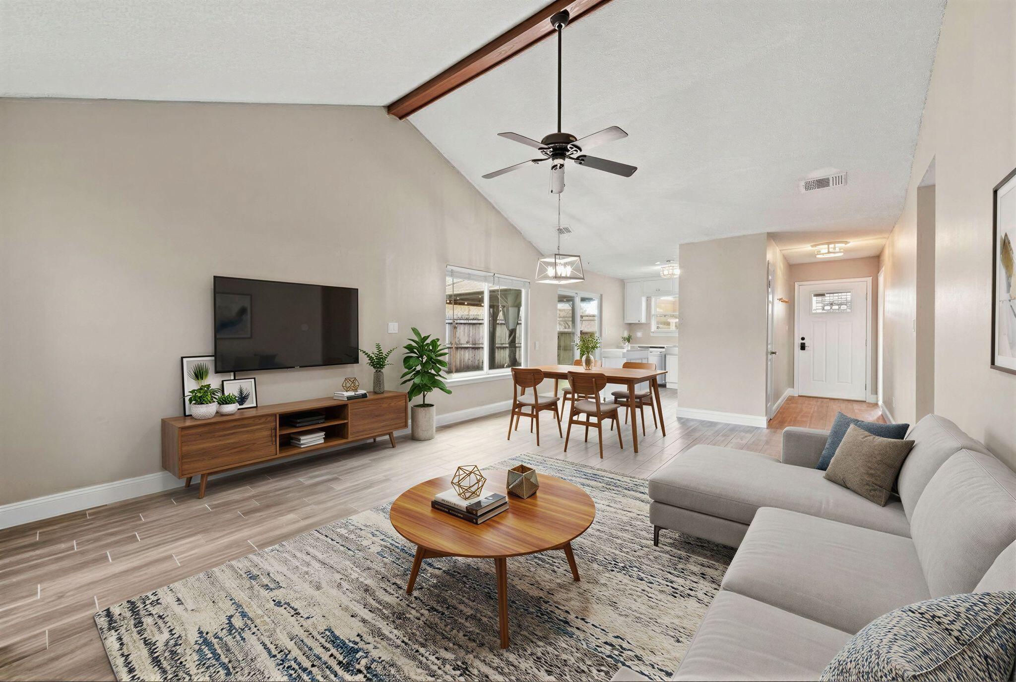 1833 Hunters Path Fort Walton Beach, FL 32547 - Photo 7 of 43 a living room with furniture and a flat screen tv