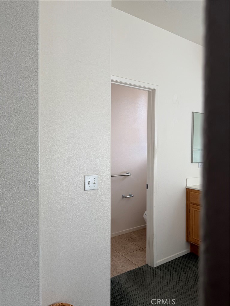 24972 Butterchurn Road Wildomar, CA 92595 - Photo 26 of 45 Master Bedroom with Separate Toilet Area
