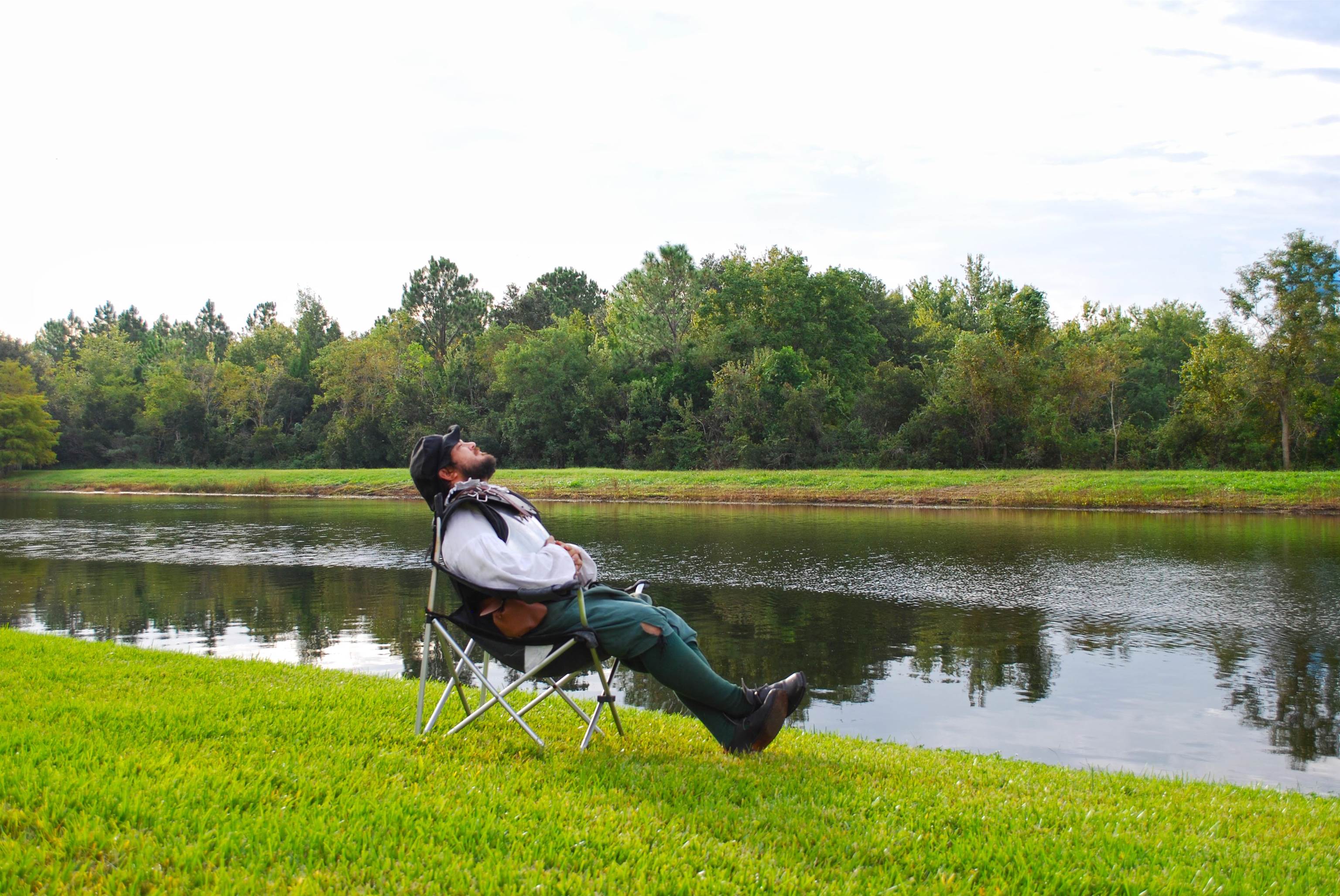 237 Syrah Way St. Augustine, FL 32084 - Photo 26 of 26 a view of a lake with a yard and large trees