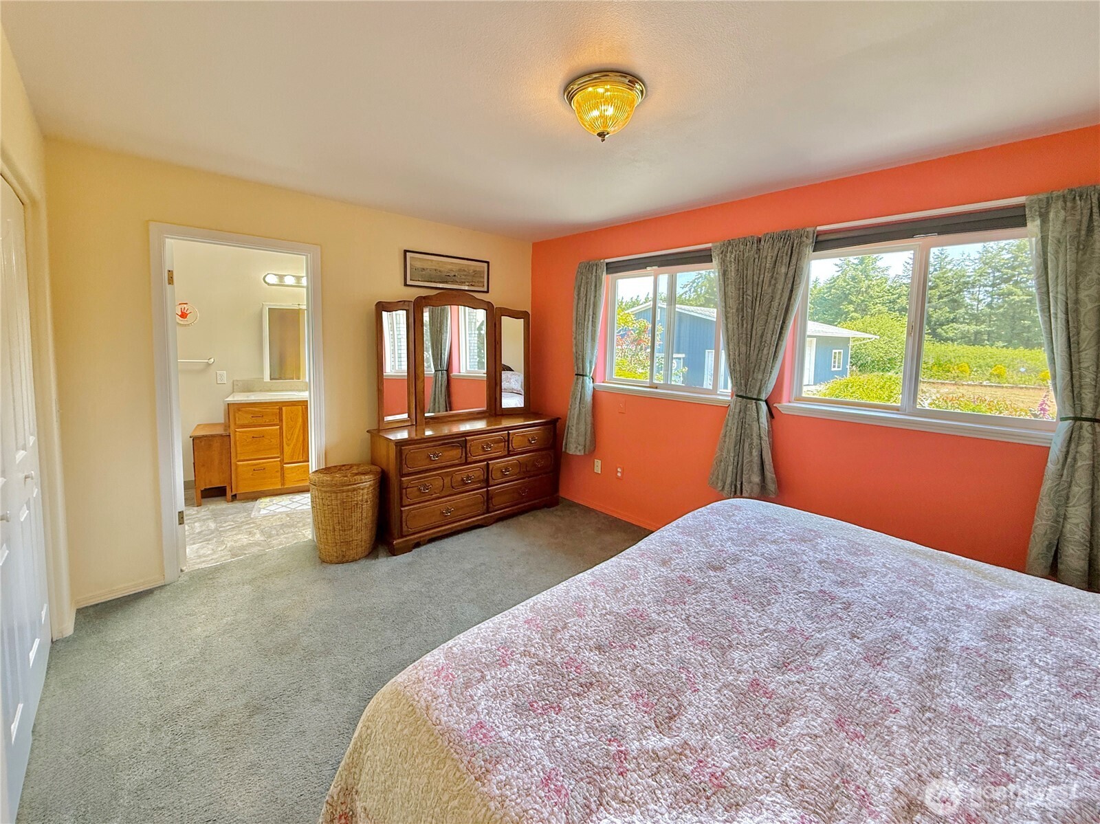 10 Davenhill Lane Sequim, WA 98382 - Photo 21 of 39 a bedroom with a bed and a large window