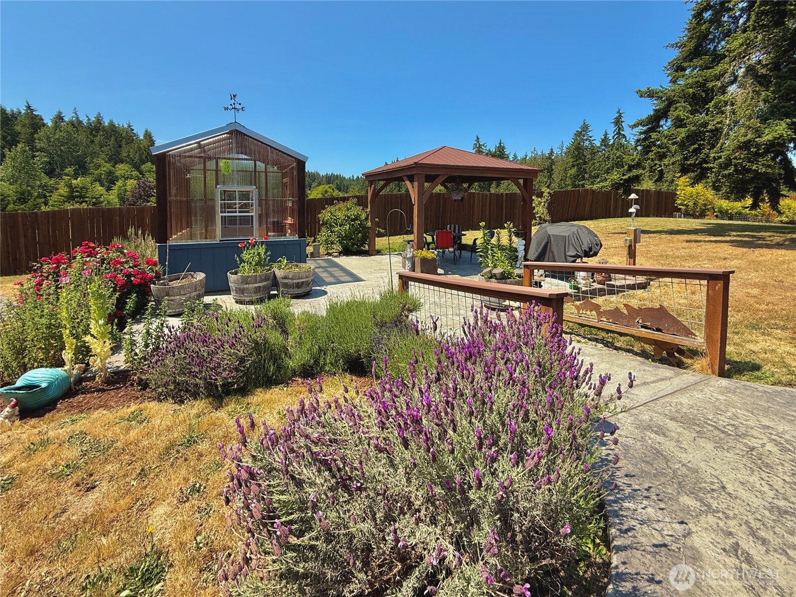 10 Davenhill Lane Sequim, WA 98382 - Photo 30 of 39 a view of a house with a yard and sitting area