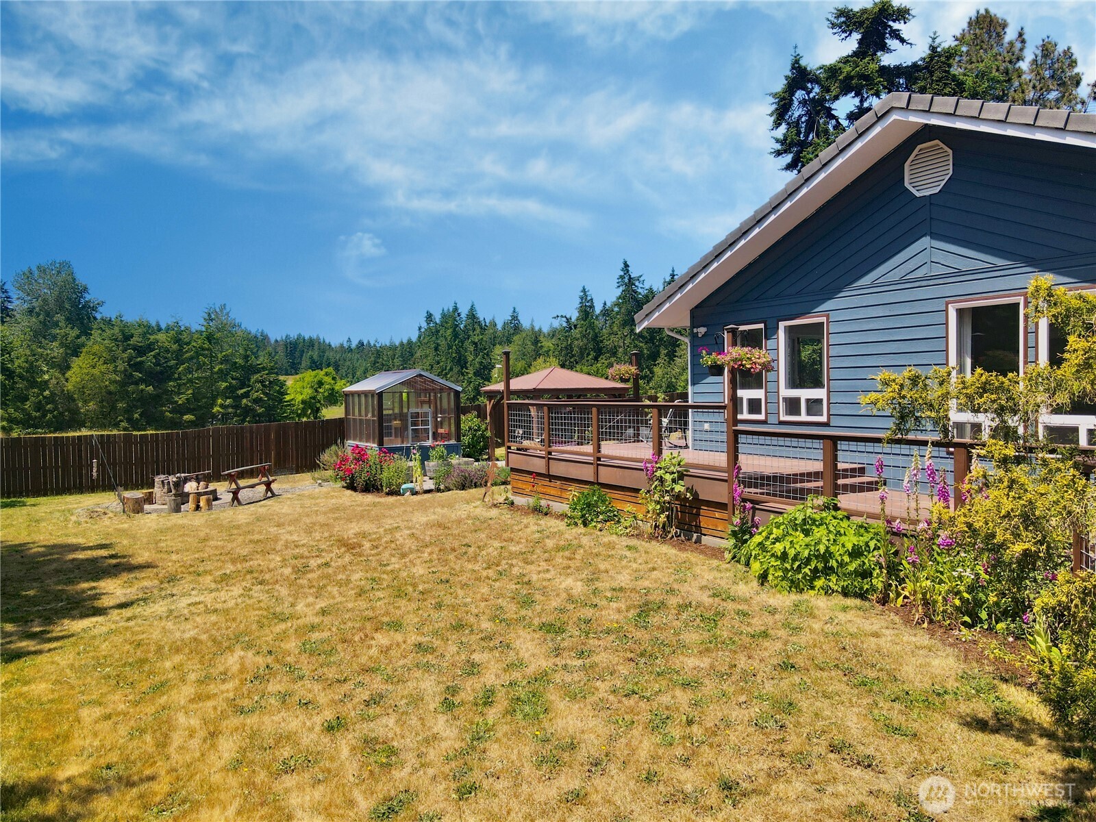 10 Davenhill Lane Sequim, WA 98382 - Photo 32 of 39 a swimming pool view with a seating space