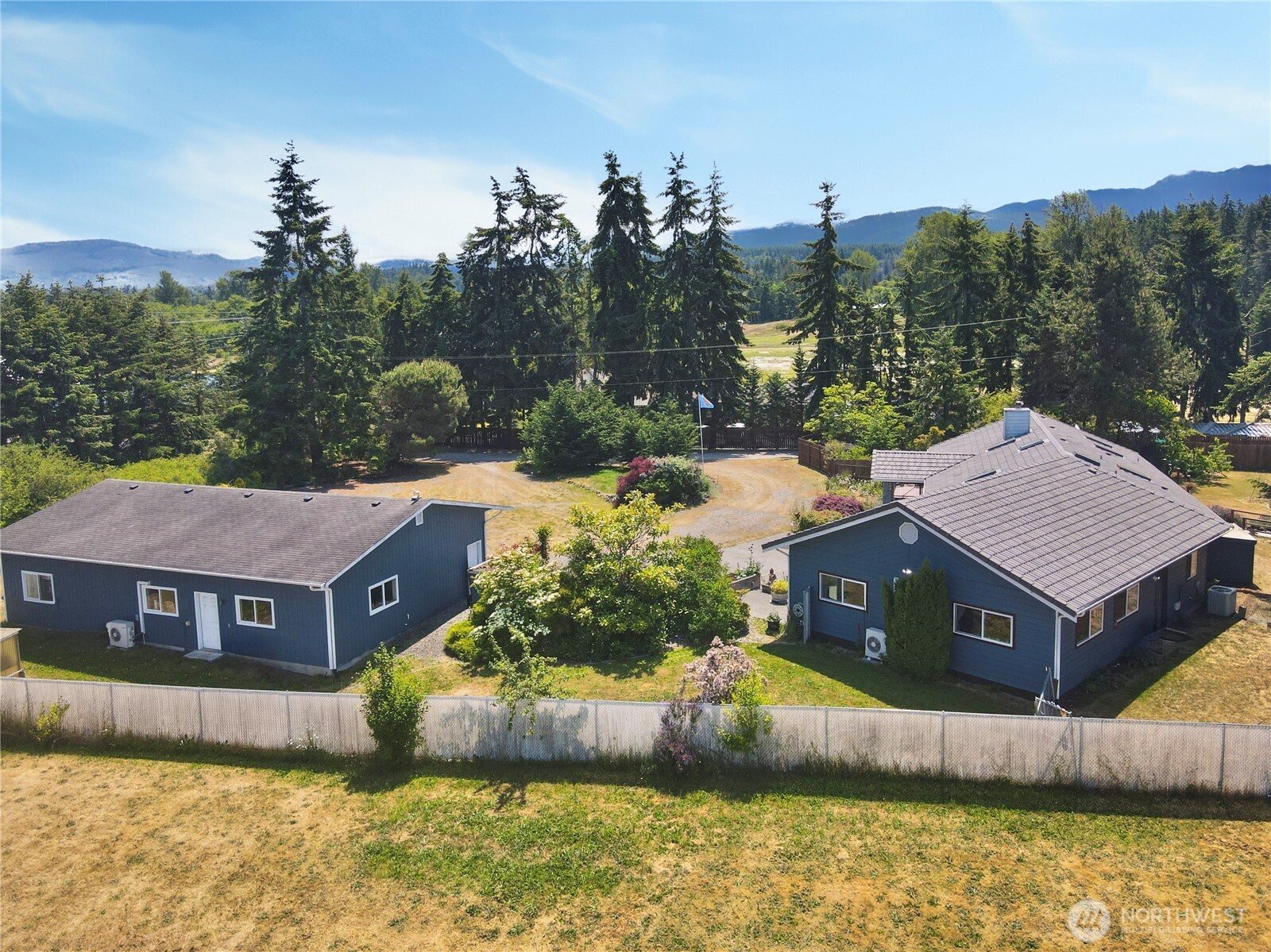 10 Davenhill Lane Sequim, WA 98382 - Photo 38 of 39 a aerial view of a house next to a yard with large tree