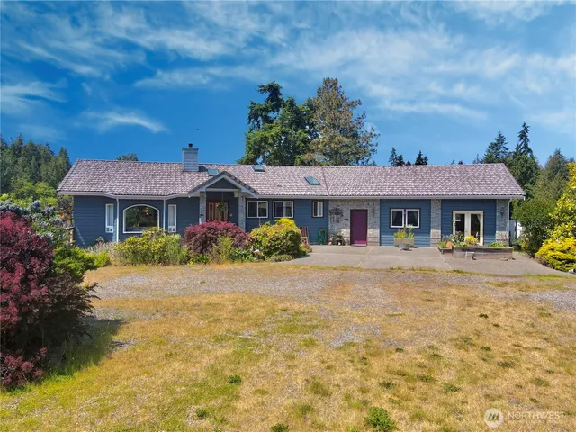 a front view of a house with swimming pool