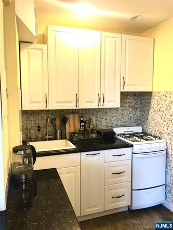 a bathroom with a sink and a bathtub