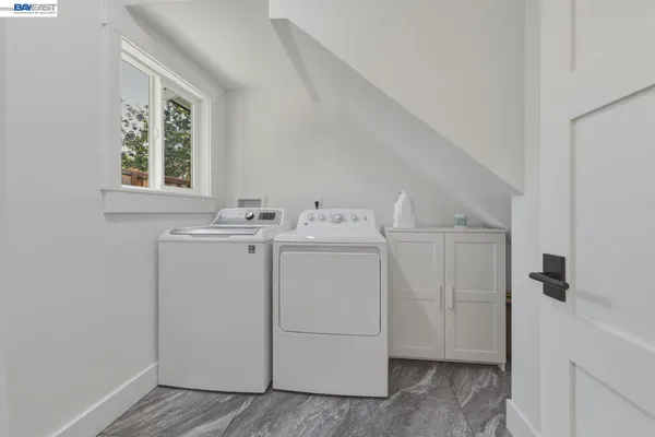 a bathroom with a sink toilet and mirror