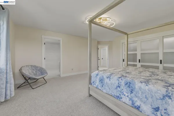 a bathroom with a double vanity sink mirror and shower