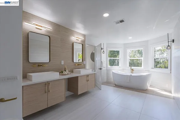 a view of a room with furniture and a window