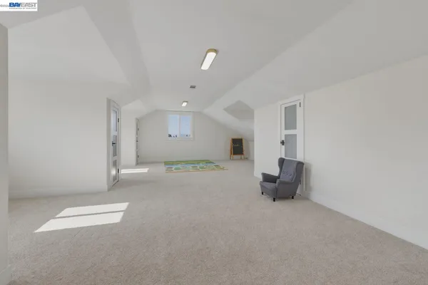 a view of house with a backyard