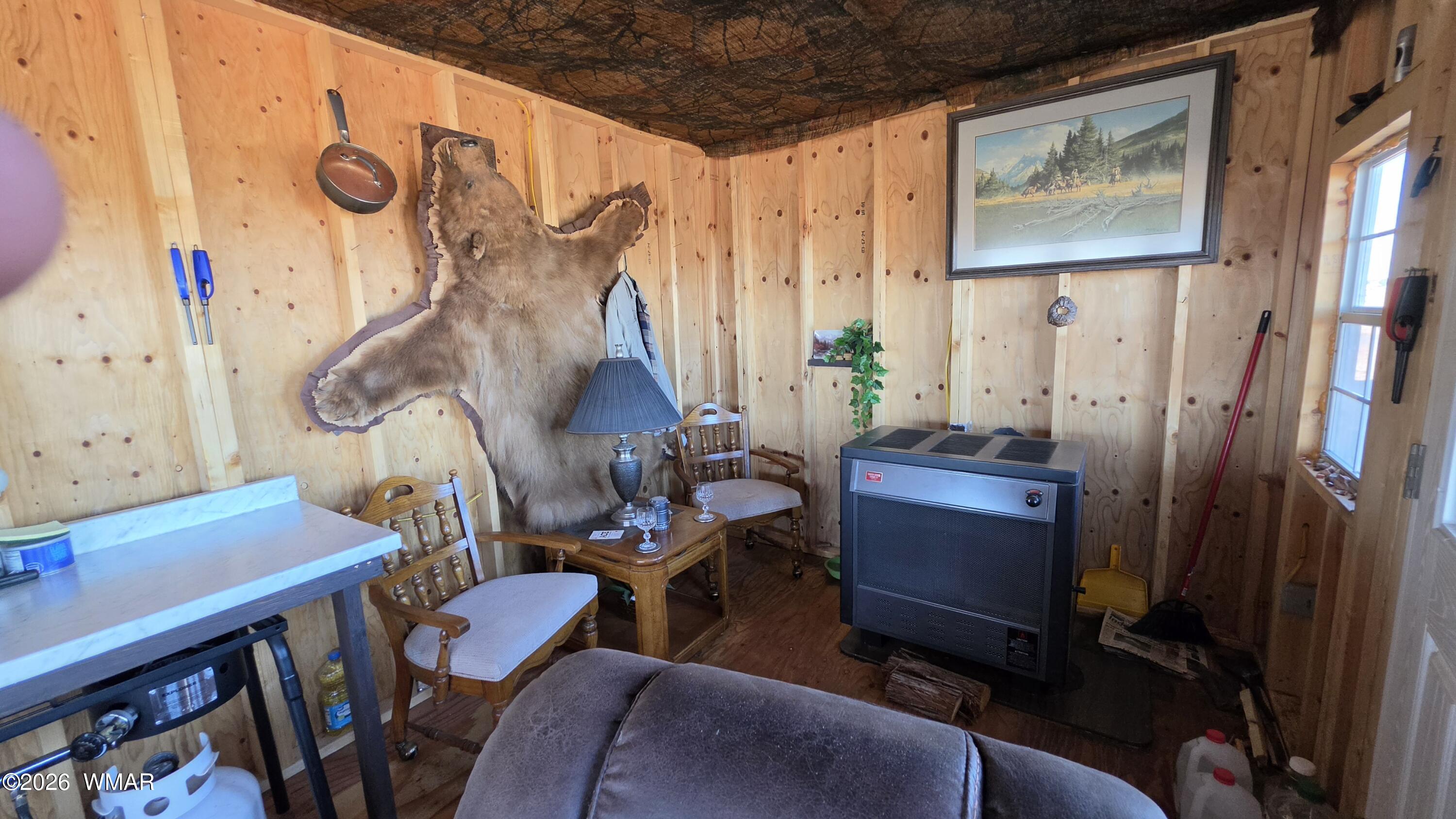 Lot 632 Lazy S Ranch Road Concho, AZ 85924 - Photo 10 of 27 a view of a dining room with furniture window and wooden floor