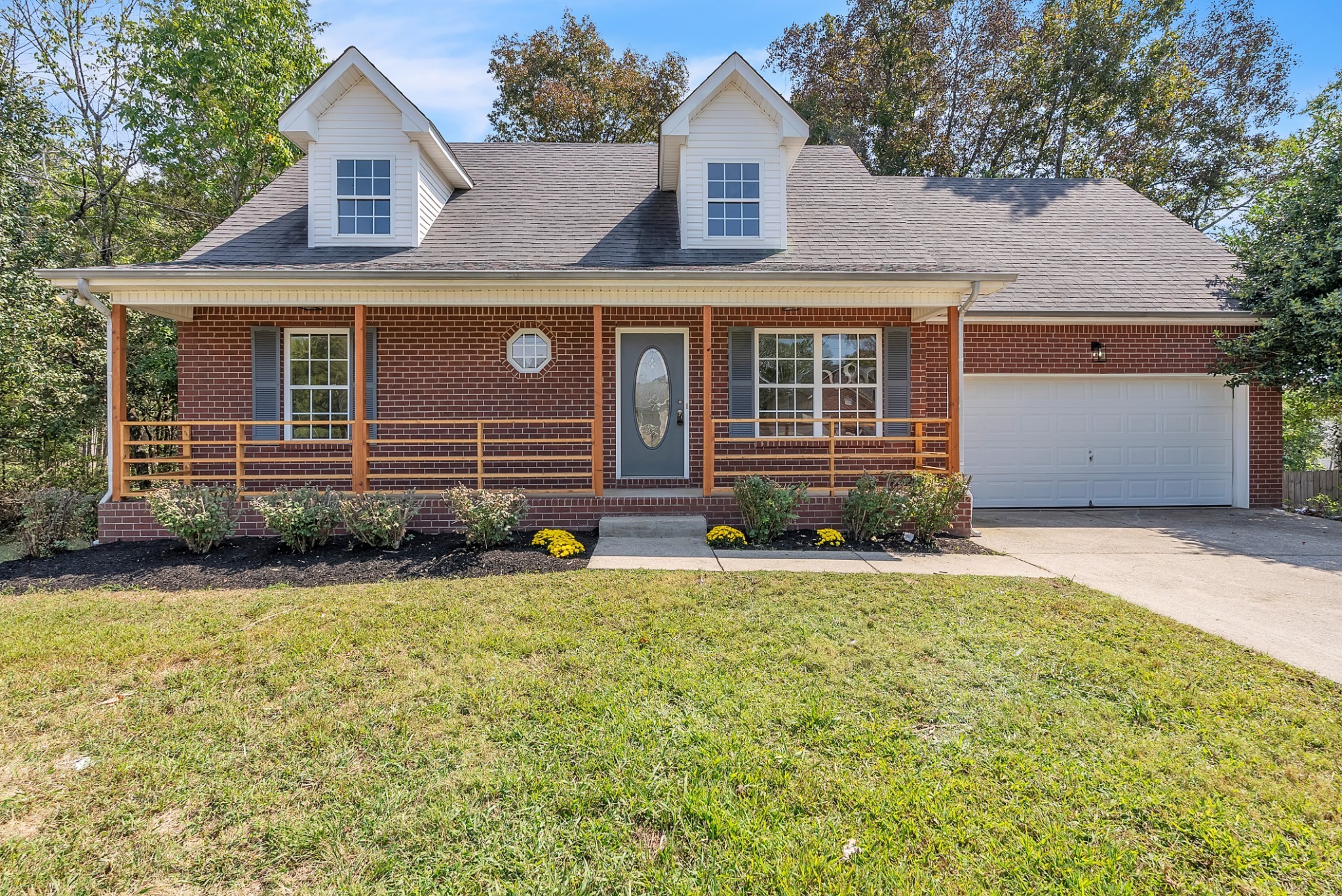 522 Acorn Way Mount Juliet, TN 37122 - Photo 1 of 30 a front view of a house with garden