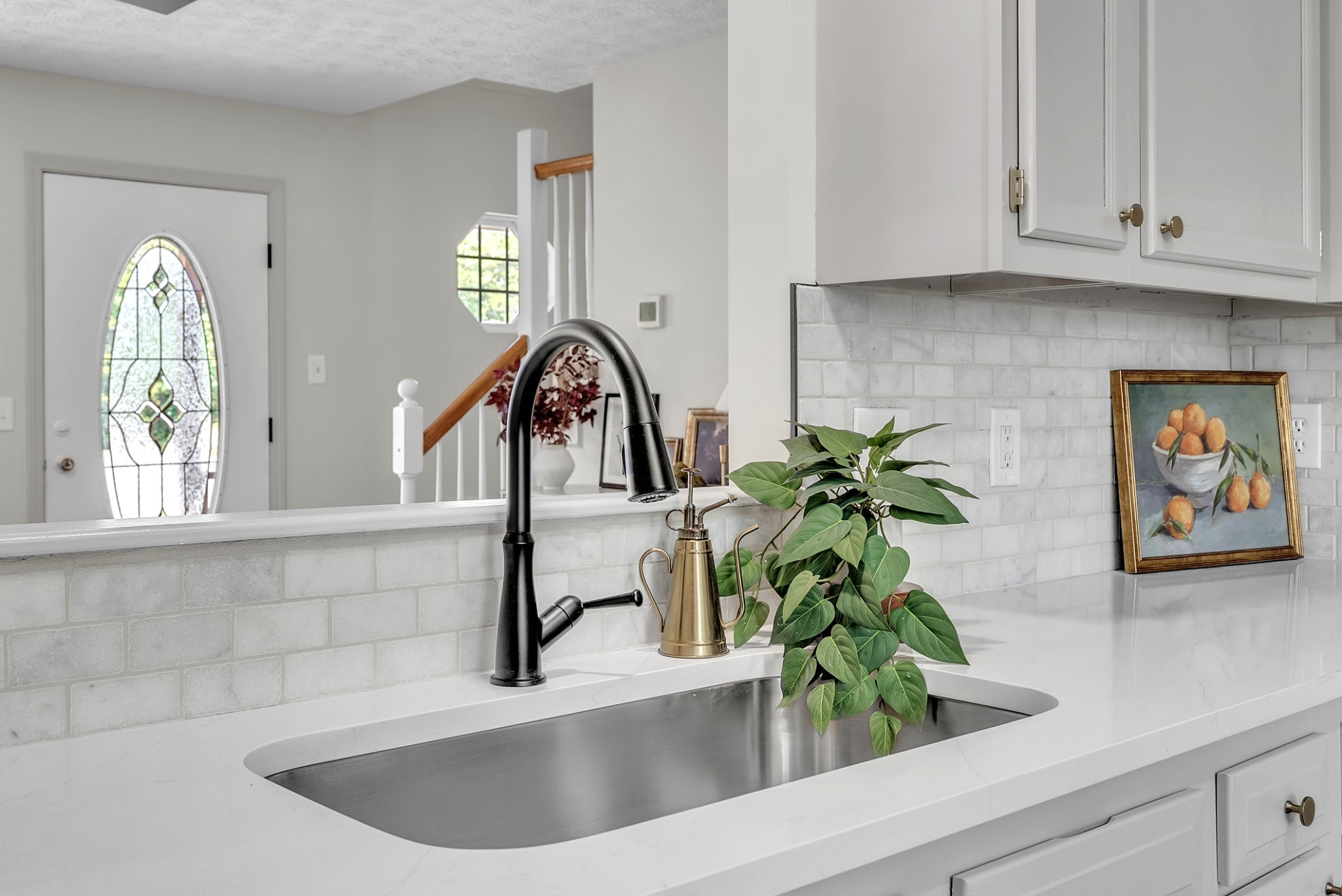 522 Acorn Way Mount Juliet, TN 37122 - Photo 11 of 30 a kitchen with a window a sink and potted plant