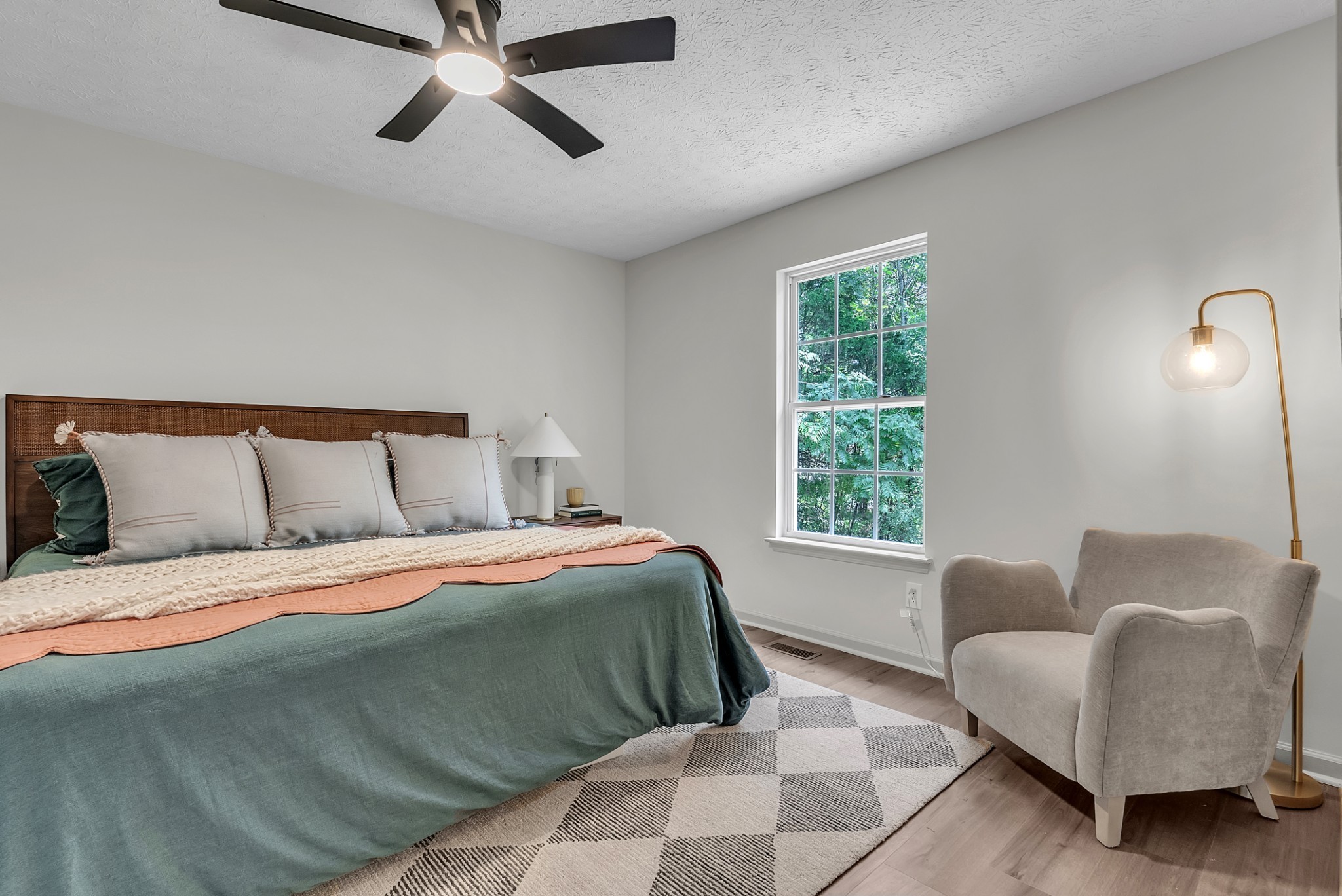 522 Acorn Way Mount Juliet, TN 37122 - Photo 15 of 30 a bedroom with a bed couch and window