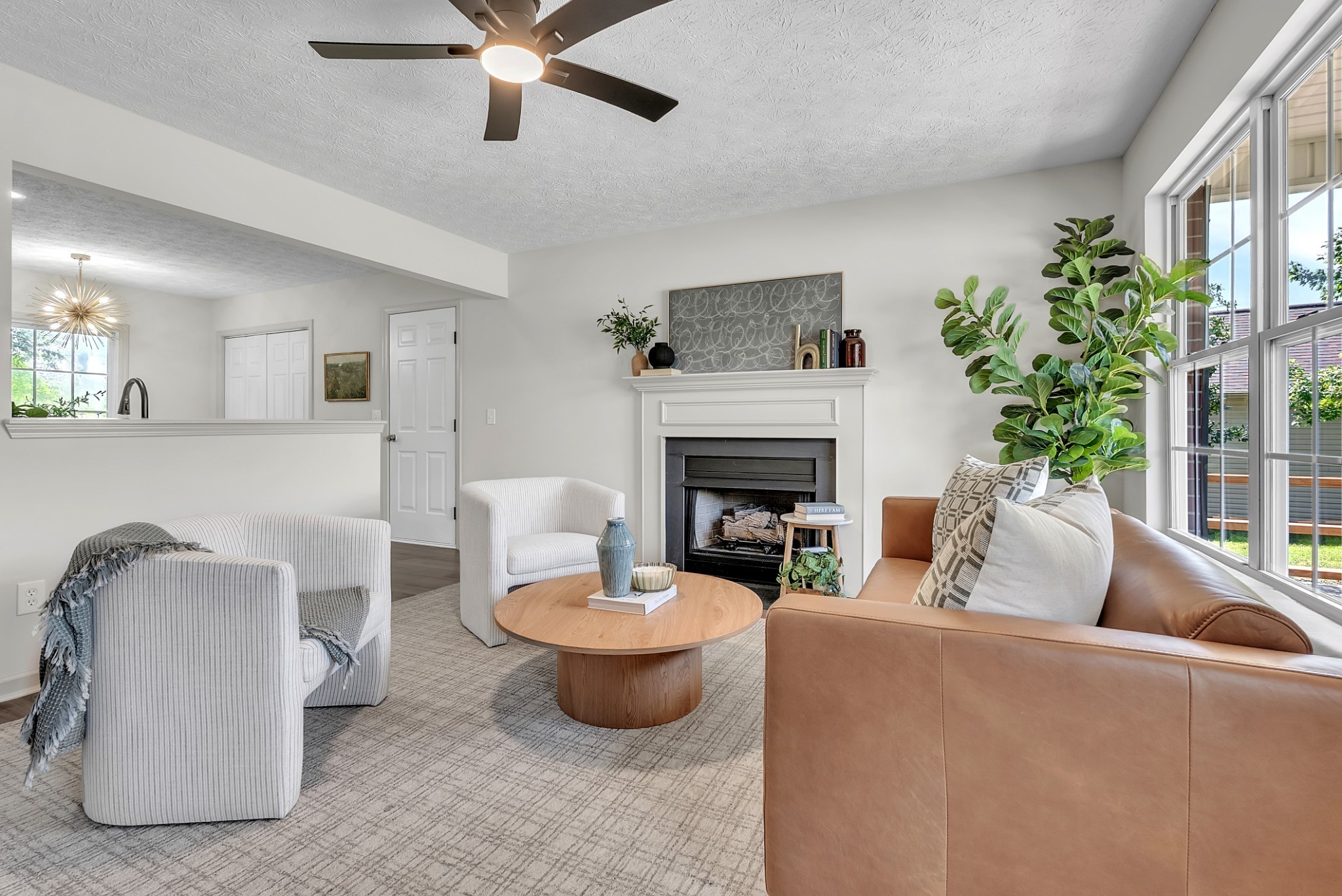 522 Acorn Way Mount Juliet, TN 37122 - Photo 5 of 30 a living room with furniture and a fireplace