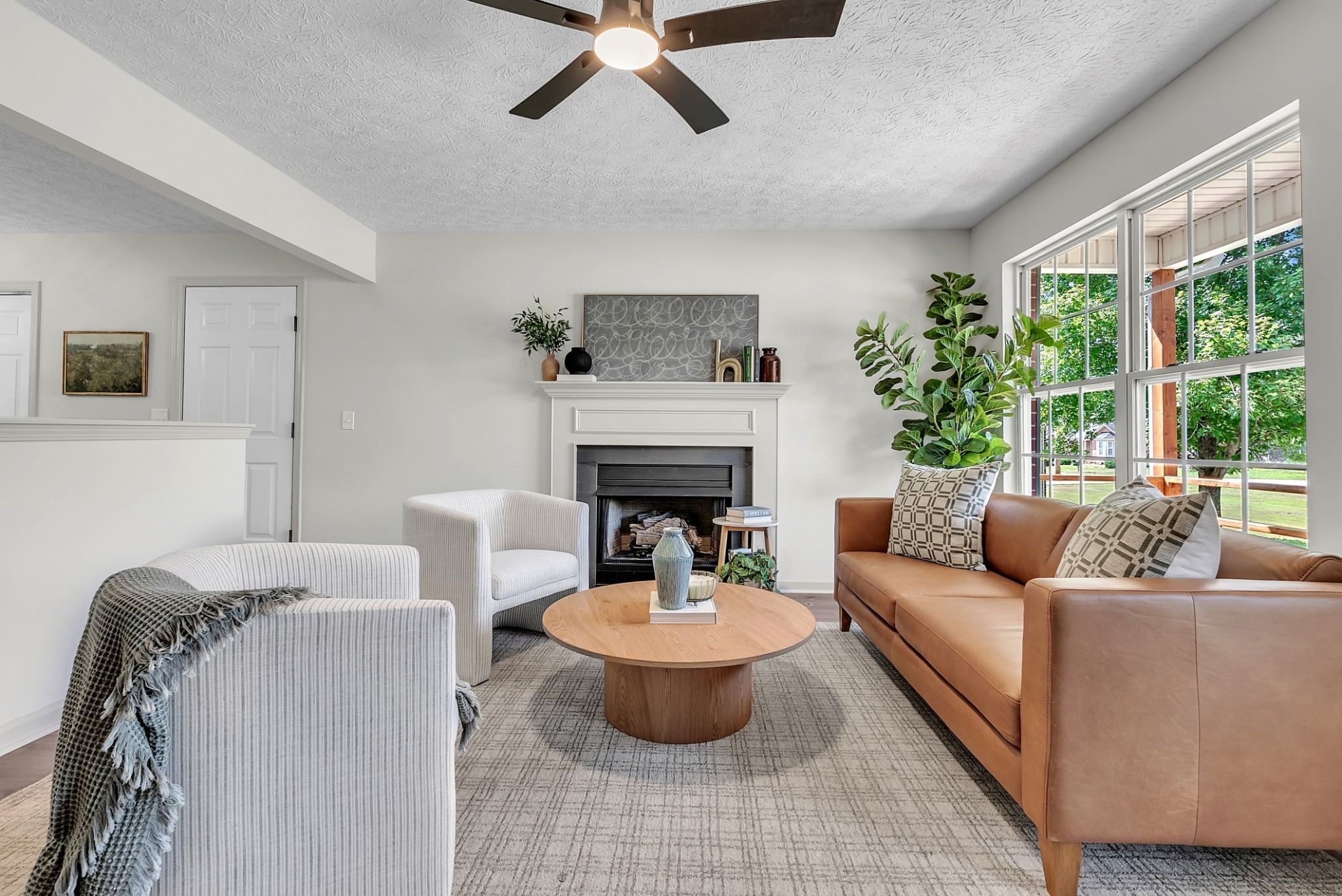 522 Acorn Way Mount Juliet, TN 37122 - Photo 6 of 30 a living room with furniture and a fireplace