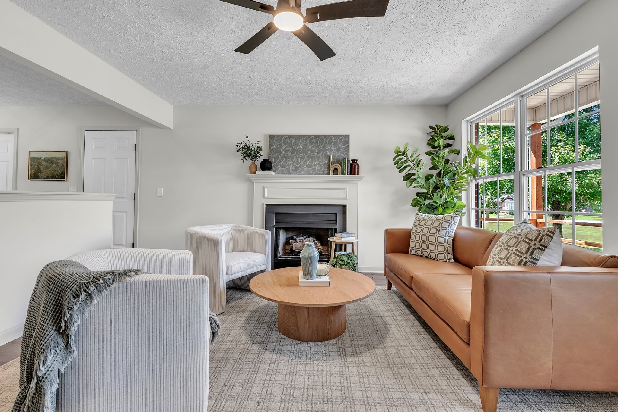 522 Acorn Way Mount Juliet, TN 37122 - Photo 7 of 30 a living room with furniture and a fireplace