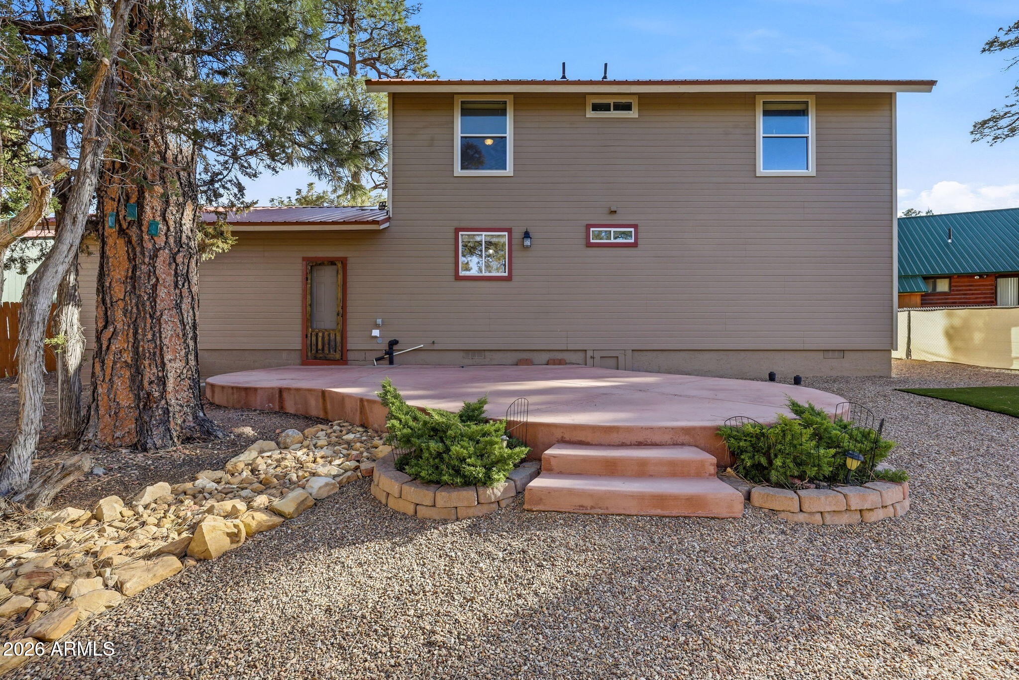 1980 Pine Cone Circle Overgaard, AZ 85933 - Photo 27 of 30 a front view of a house with a yard