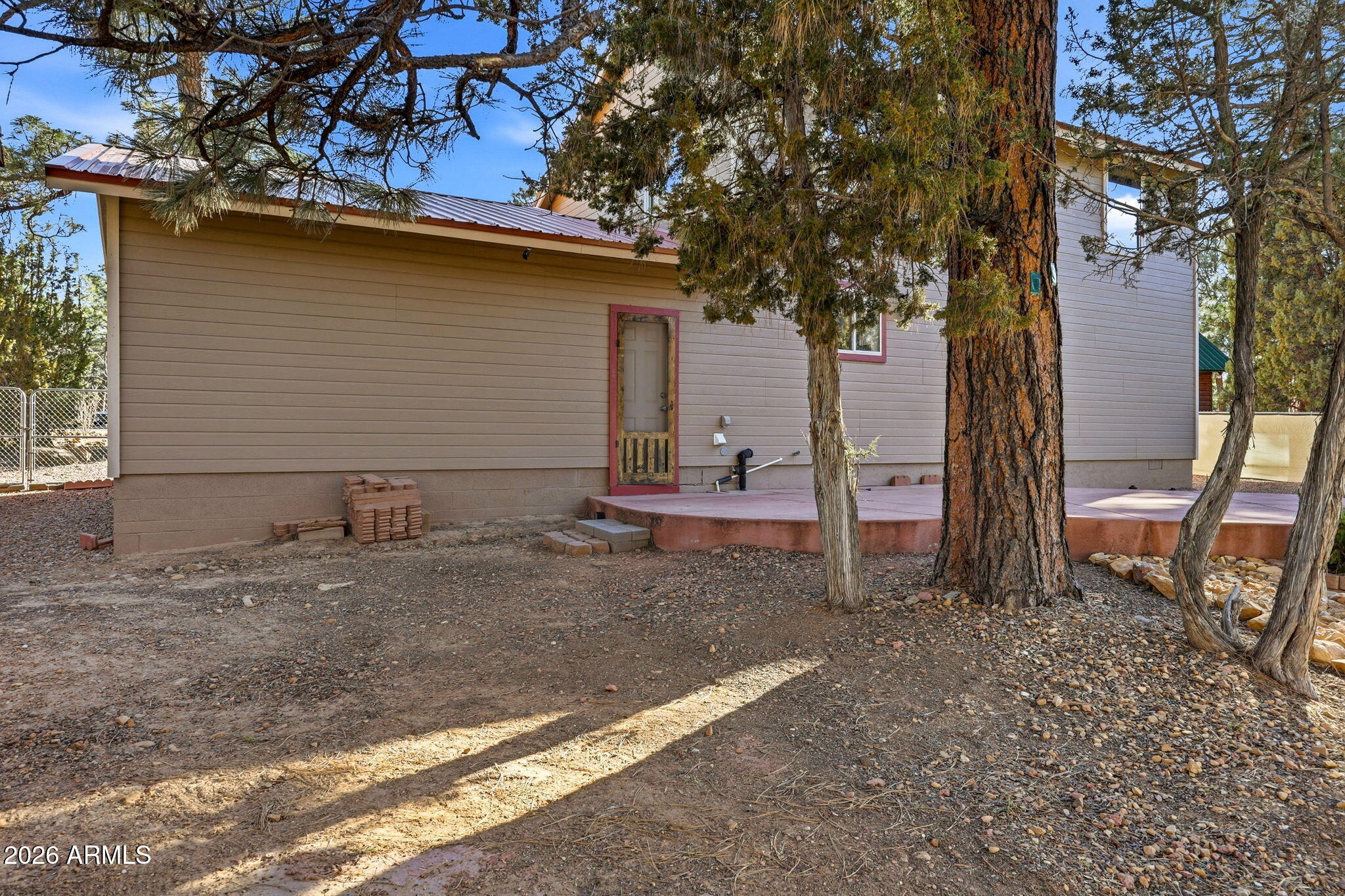1980 Pine Cone Circle Overgaard, AZ 85933 - Photo 28 of 30 a view of a house with backyard