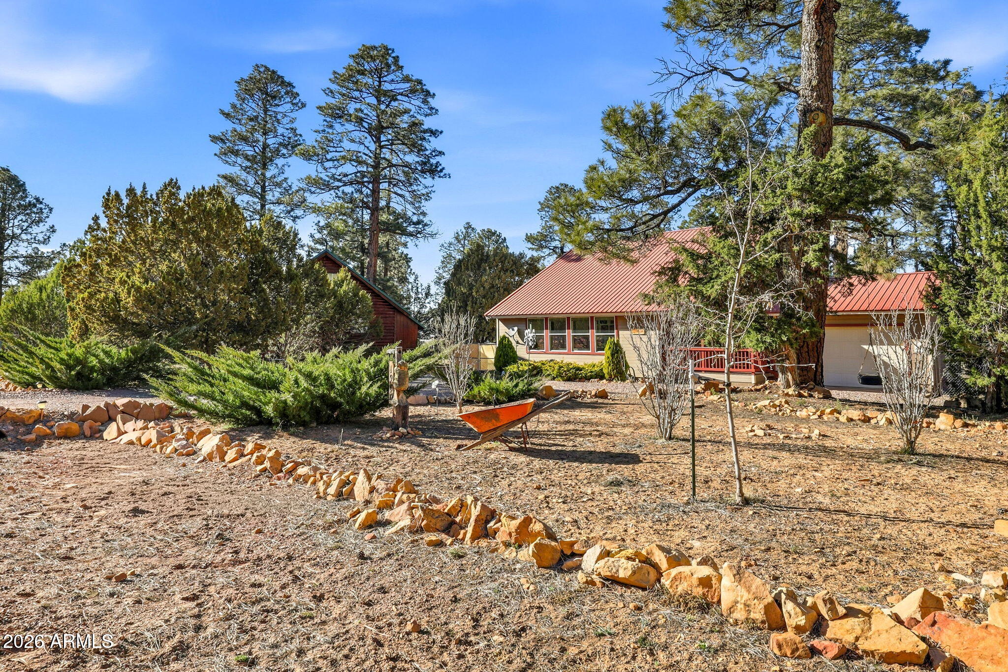 1980 Pine Cone Circle Overgaard, AZ 85933 - Photo 4 of 30 a view of a patio with swimming pool