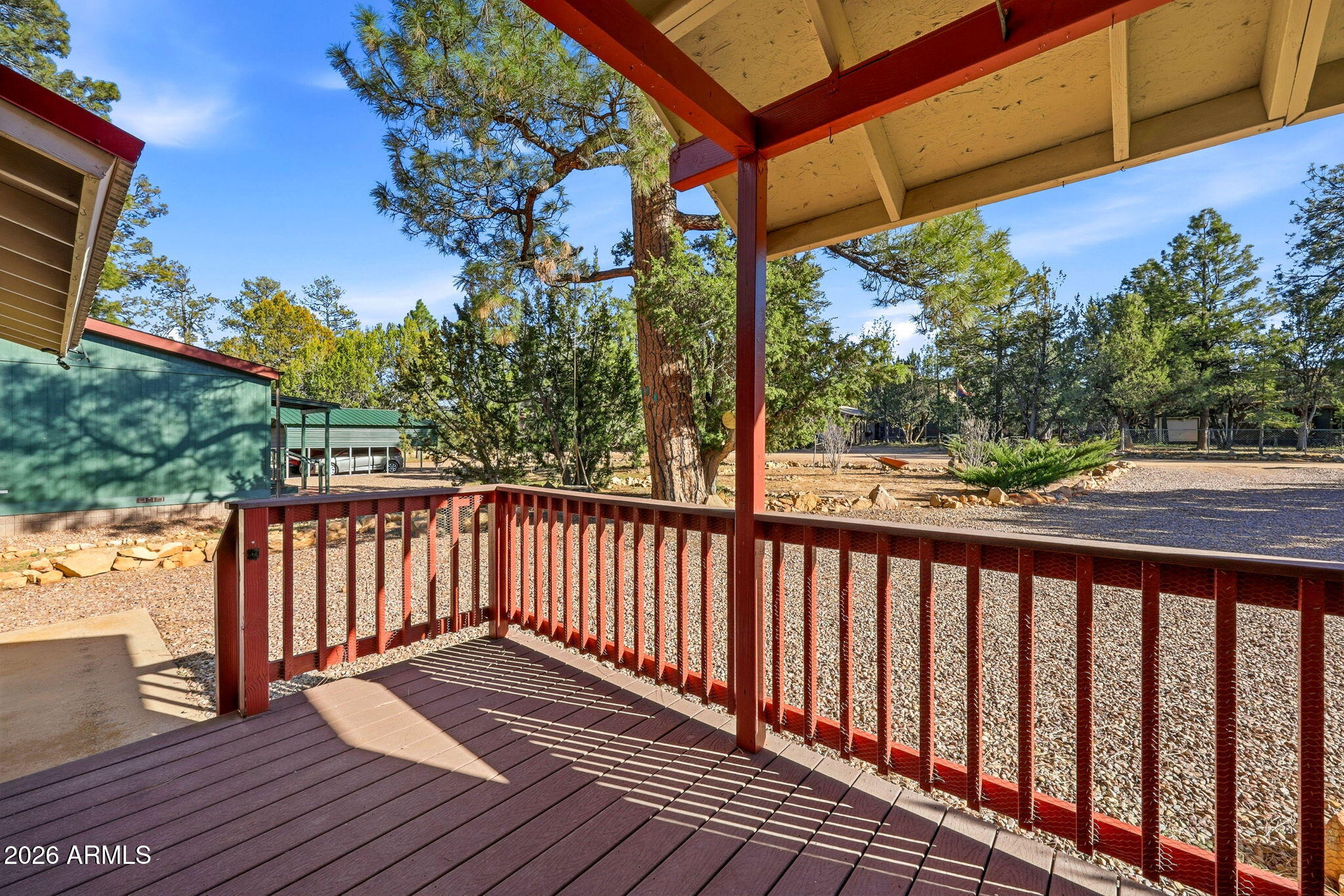 1980 Pine Cone Circle Overgaard, AZ 85933 - Photo 5 of 30 a view of a wooden deck