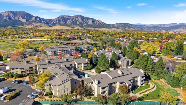 a view of balcony with outdoor seating and city view