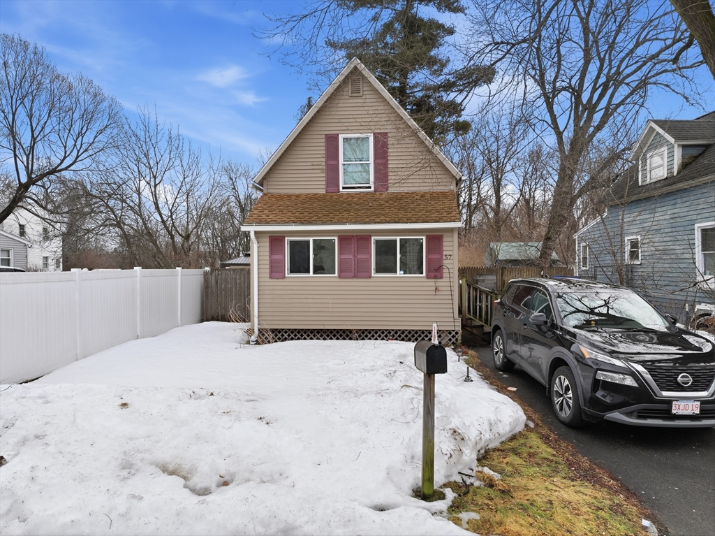 57 Davenport Street Springfield, MA 01119 - Photo 1 of 21 a car parked in front of a house