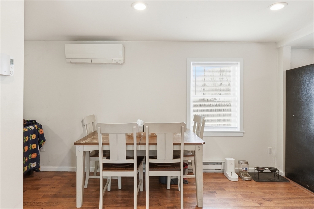 57 Davenport Street Springfield, MA 01119 - Photo 11 of 21 a view of a dining room with furniture and wooden floor