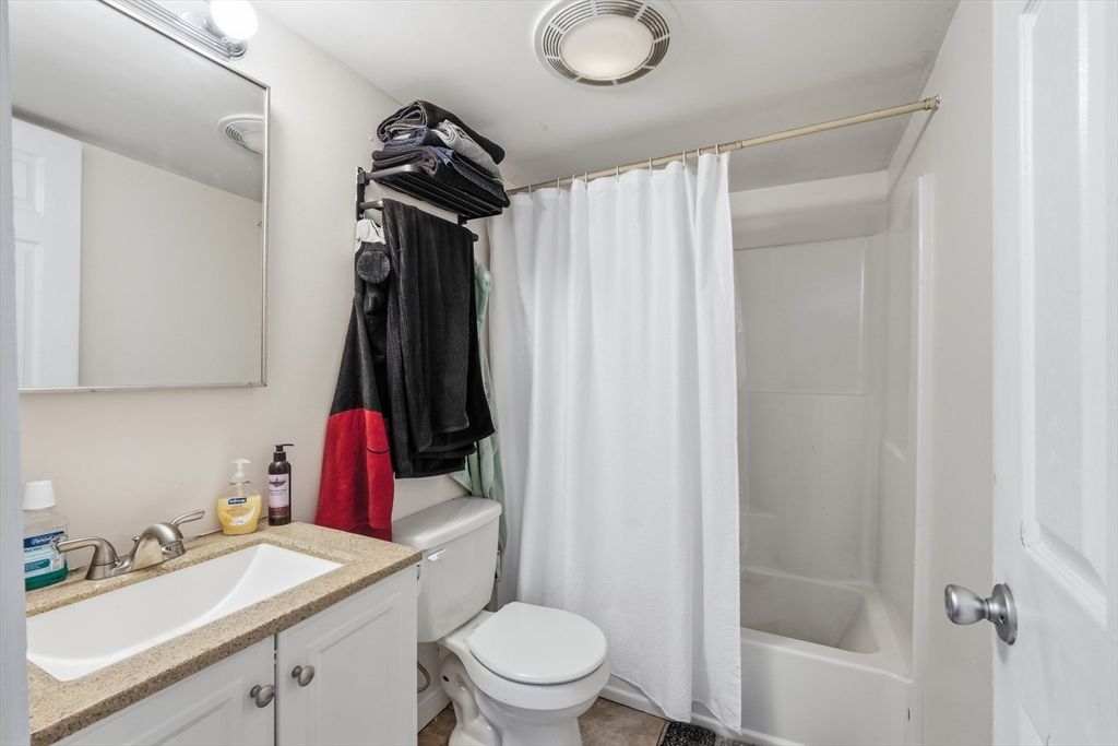 57 Davenport Street Springfield, MA 01119 - Photo 16 of 21 a bathroom with a sink toilet and shower