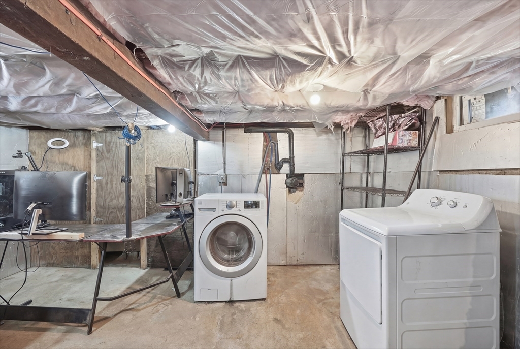 57 Davenport Street Springfield, MA 01119 - Photo 18 of 21 a utility room with dryer and washer