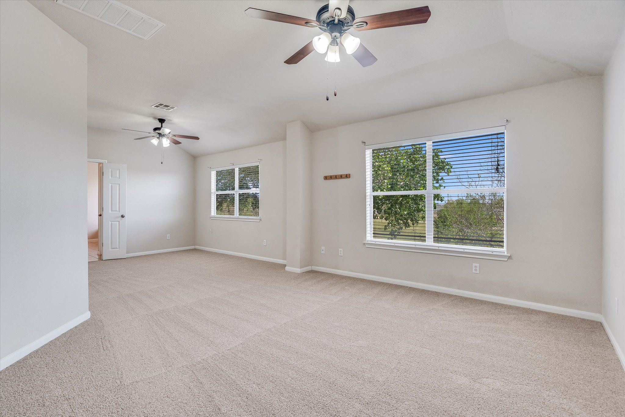 4029 Lake Edge Way Pflugerville, TX 78660 - Photo 13 of 35 a view of an empty room with a window