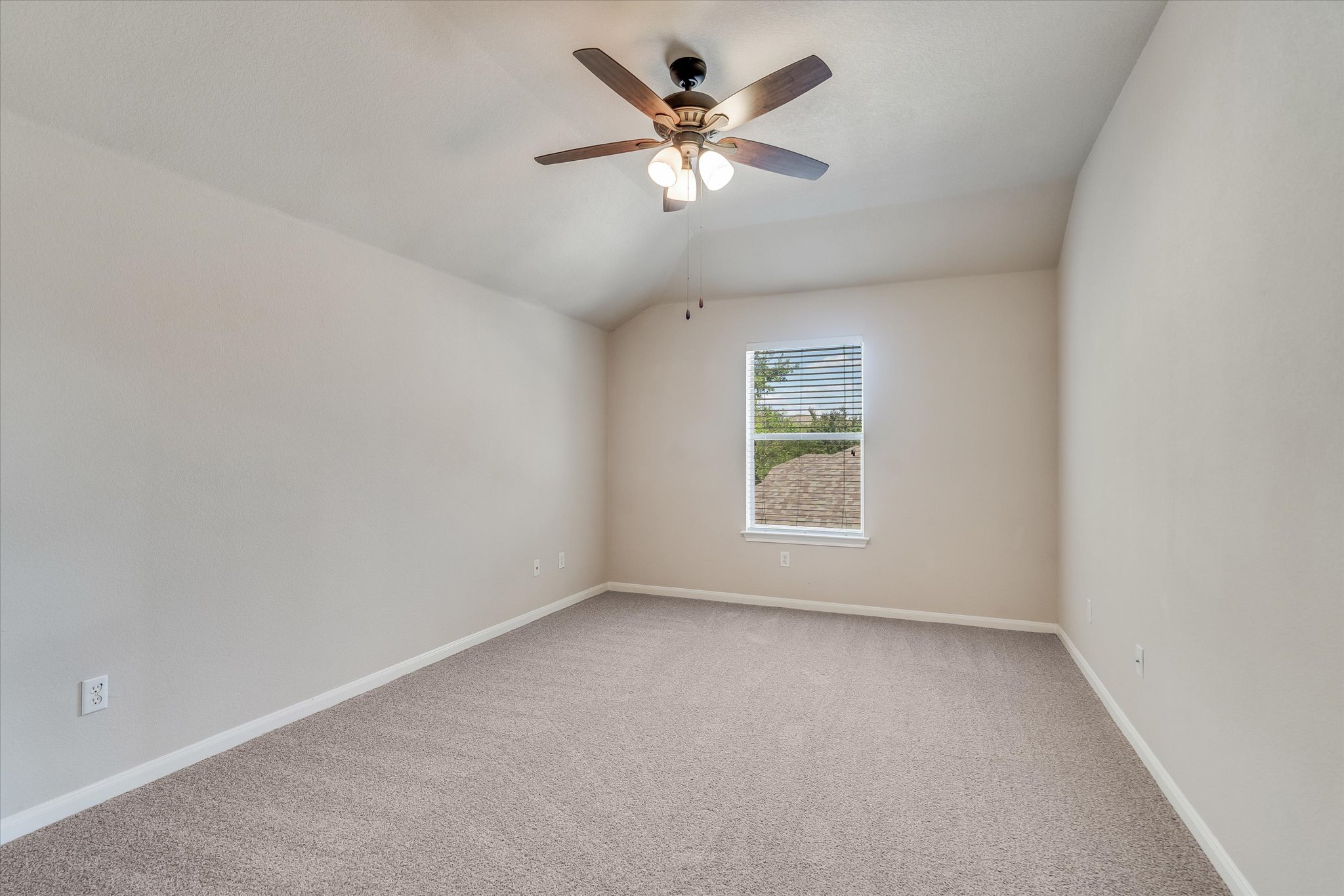 4029 Lake Edge Way Pflugerville, TX 78660 - Photo 19 of 35 an empty room with a window and a fan