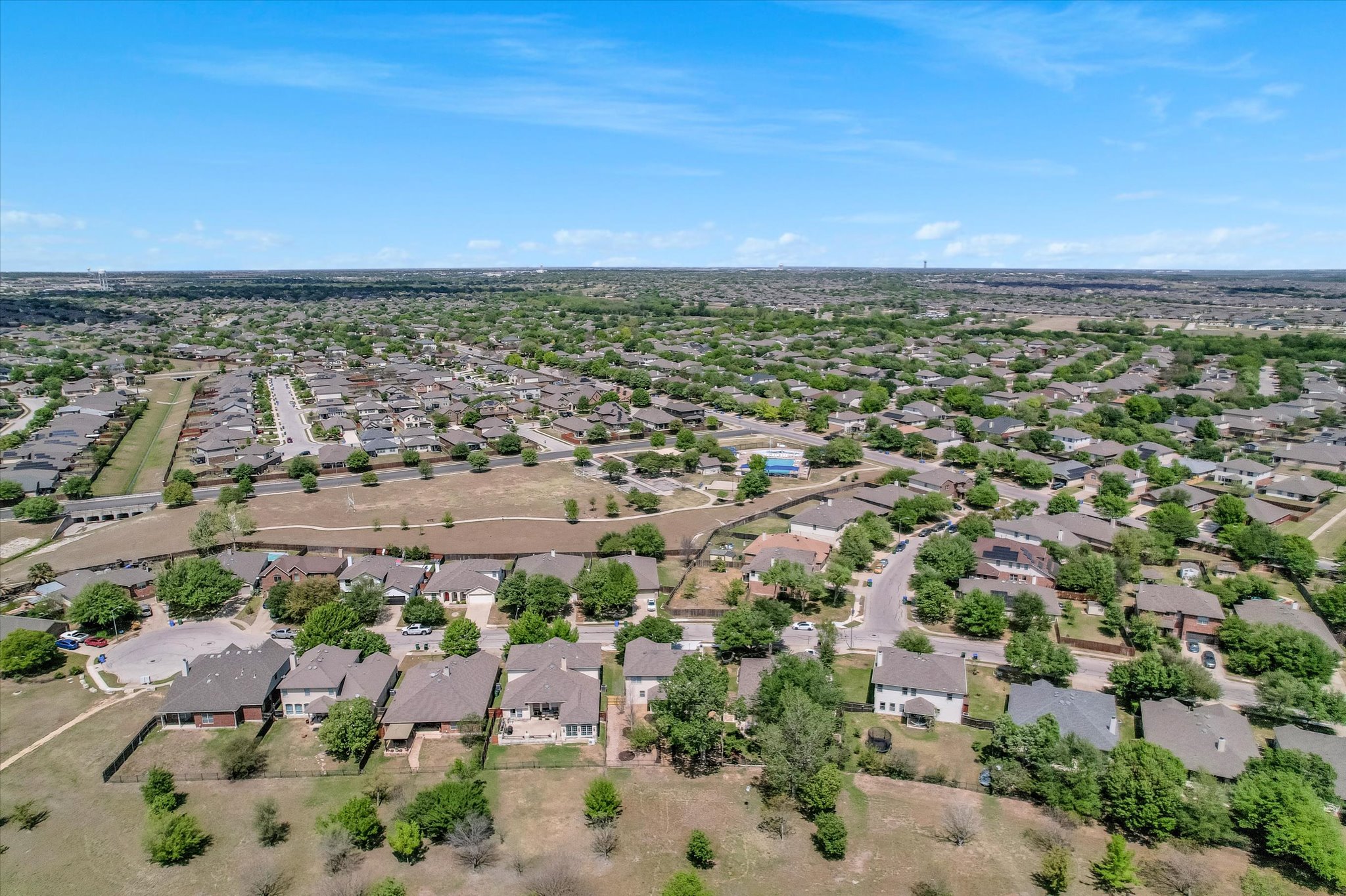 4029 Lake Edge Way Pflugerville, TX 78660 - Photo 33 of 35 an aerial view of a city with lots of residential buildings