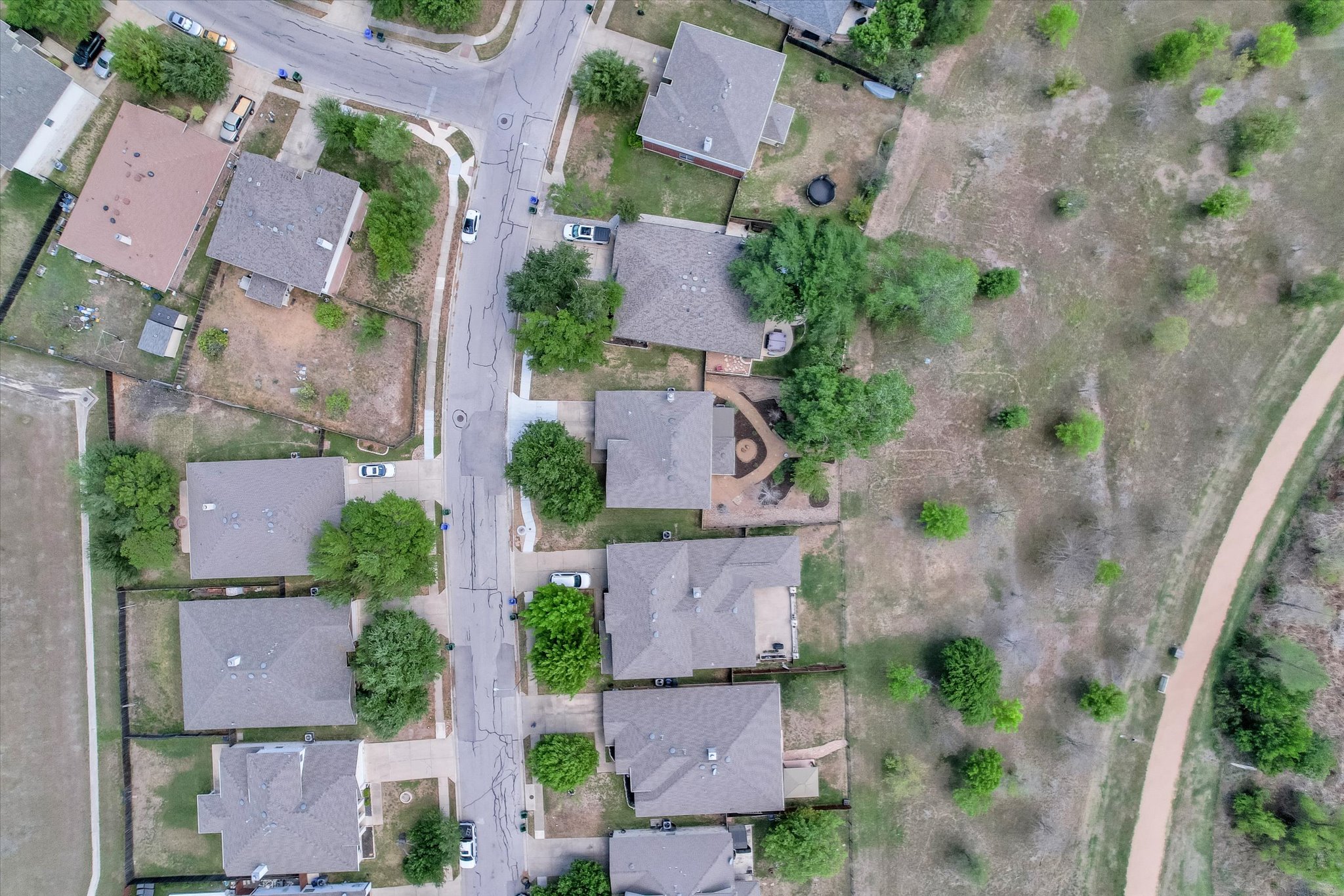 4029 Lake Edge Way Pflugerville, TX 78660 - Photo 34 of 35 an aerial view of residential houses with outdoor space