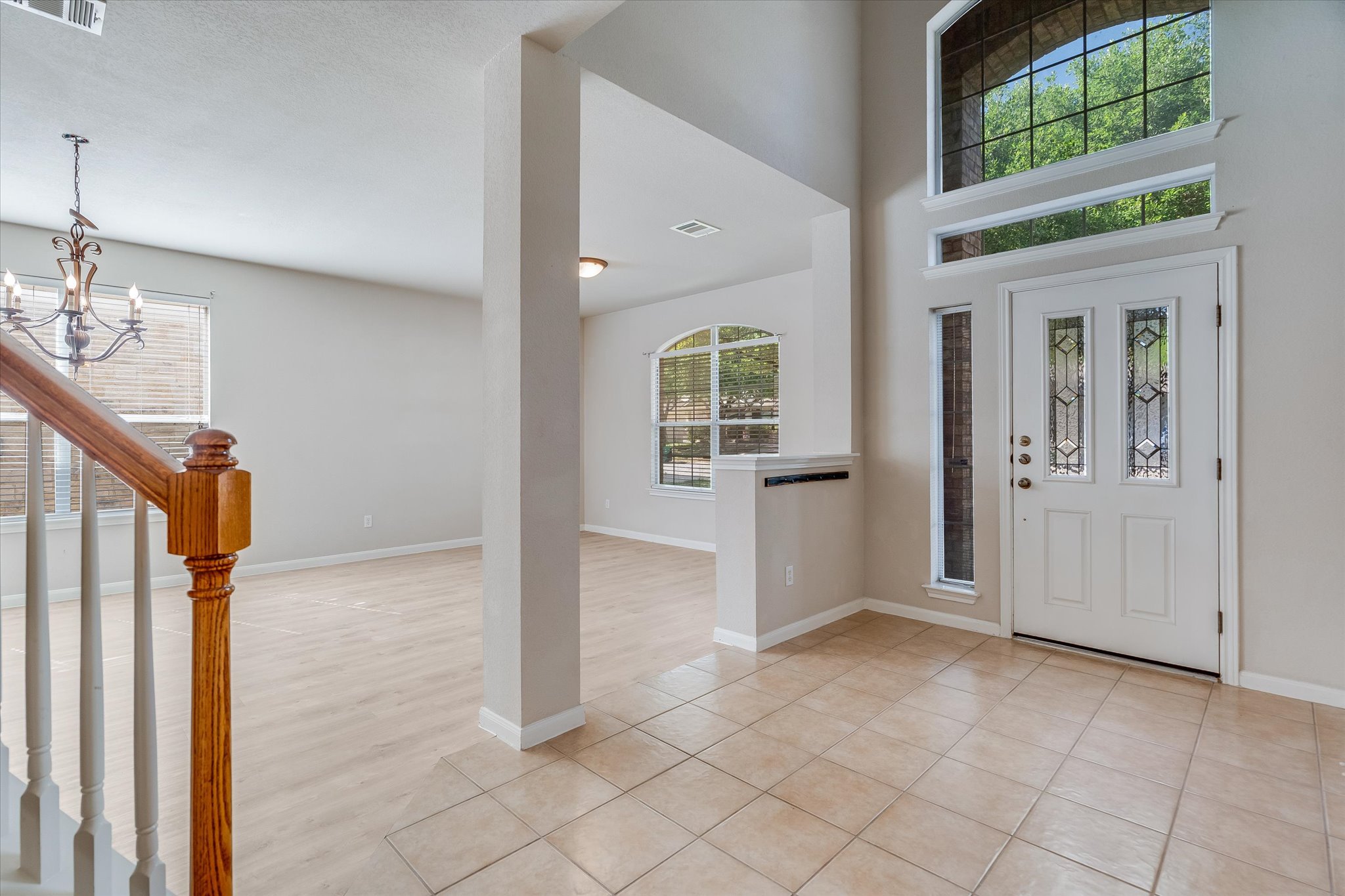 4029 Lake Edge Way Pflugerville, TX 78660 - Photo 4 of 35 wooden floor in an empty room with a window