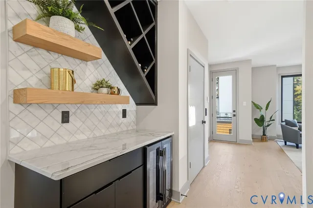a bathroom with a sink and mirror