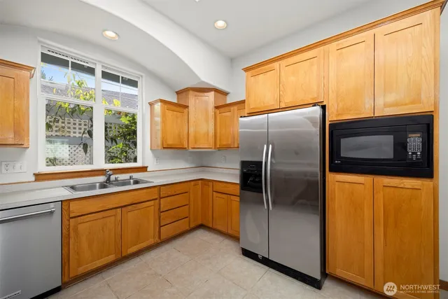 an empty room that has a large window