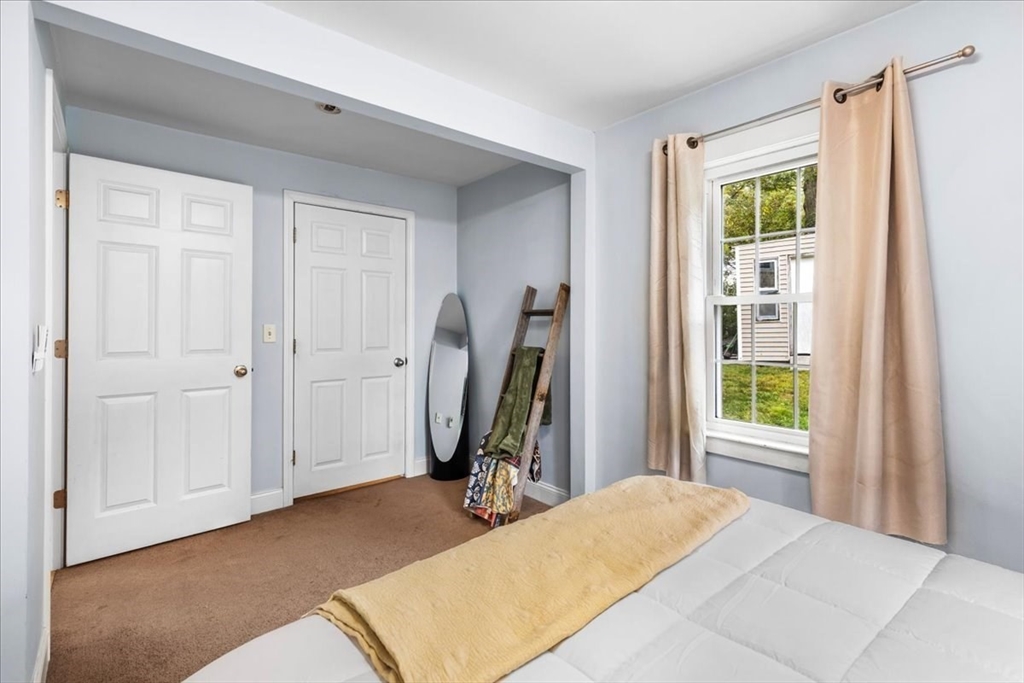 20 Cooks Lane Bellingham, MA 02019 - Photo 12 of 21 a bedroom with a bed and a window