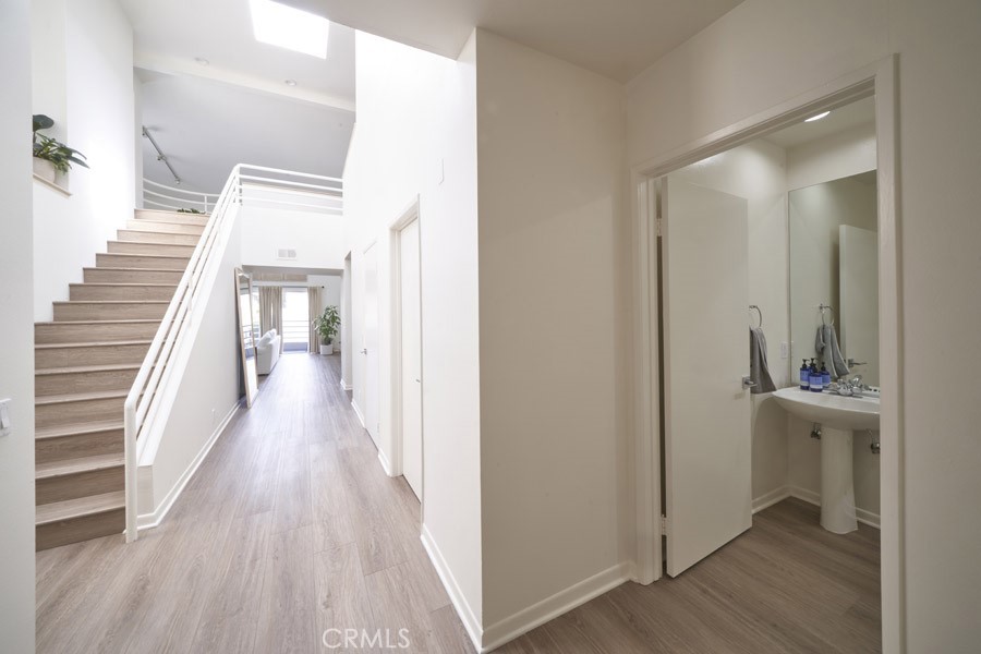 1617 South Beverly Glen Boulevard, Unit 303 Los Angeles, CA 90024 - Photo 27 of 55 a view of a hallway with wooden floor and entryway