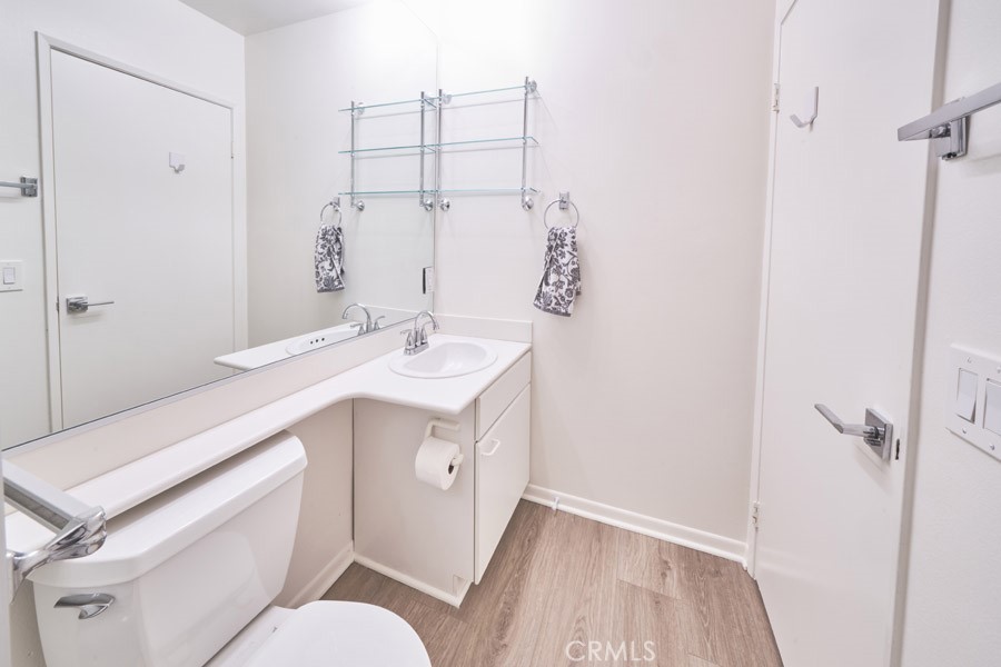 1617 South Beverly Glen Boulevard, Unit 303 Los Angeles, CA 90024 - Photo 37 of 55 a bathroom with a sink a toilet and shower