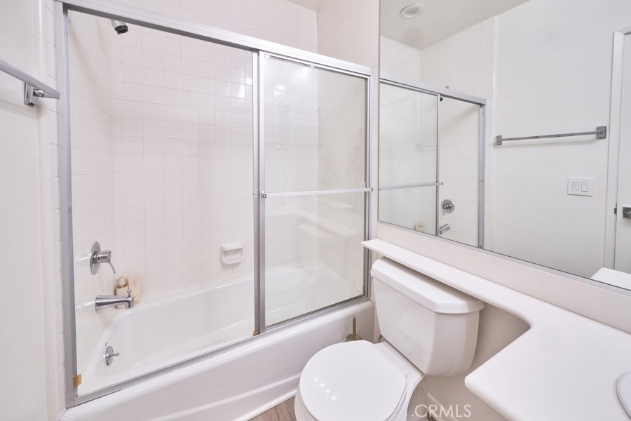 1617 South Beverly Glen Boulevard, Unit 303 Los Angeles, CA 90024 - Photo 40 of 55 a bathroom with a toilet and a shower
