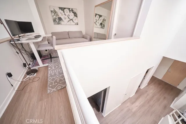 a living room with a couch and a flat screen tv