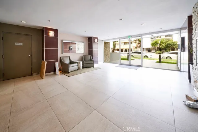 a balcony with furniture and city view