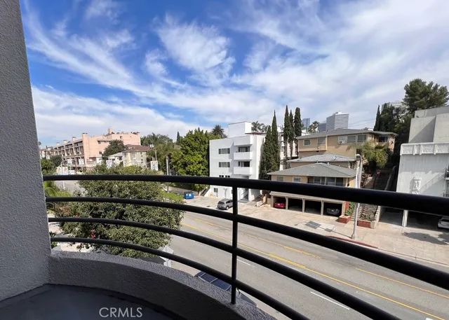 a front view of a building with street view