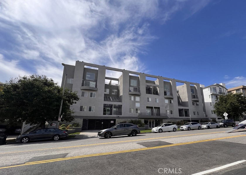 1617 South Beverly Glen Boulevard, Unit 303 Los Angeles, CA 90024 - Photo 55 of 55 a front view of a building with street view