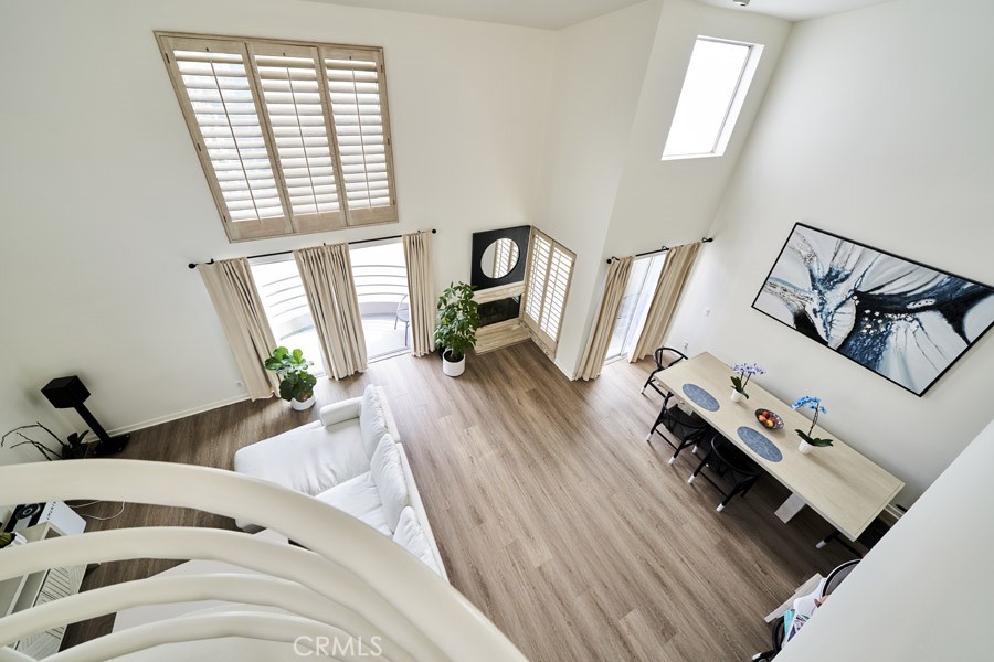 1617 South Beverly Glen Boulevard, Unit 303 Los Angeles, CA 90024 - Photo 7 of 55 a living room with furniture and a window